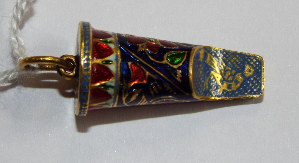 An Indian yellow coloured metal and enamel whistle, decorated birds, flowers and foliage Condition - Image 3 of 7