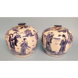 A pair of Chinese porcelain vases and covers, decorated figures, 17.