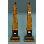 A pair of faux marble obelisks, 52.5 cm high (2) Condition report Report by NG

One obelisk has