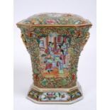 A Chinese porcelain famille rose bough pot and cover, 21.5 cm high  See illustration Condition