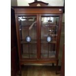 An Edwardian inlaid mahogany display cabinet, inset Jasperware style panels, 99 cm wide Condition