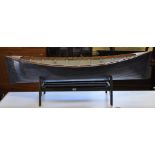 A model of a clinker built rowing boat, 152 cm wide, on a stand Condition report Report by GH
