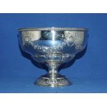 A silver pedestal bowl, decorated floral swags, Sheffield 1909, approx. 9.