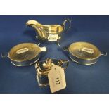 A silver cream jug, Birmingham 1929, two butter dishes, and a mustard pot, approx. 6.