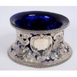 An Irish style silver potato dish ring, with rococo style pierced decoration, Birmingham 1901,