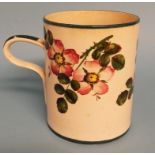 A Wemyss pottery mug, decorated flowers and foliage (cracked), 14.5 cm high Condition report