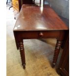 A mahogany Pembroke table, with single frieze drawer, on turned legs,