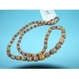 An opal and ruby faceted bead necklace