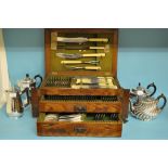 A silver plated table service, in an oak canteen, 46.