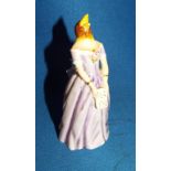 A Royal Worcester candle extinguisher, Confidence, modelled as the singer Jenny Lind, 11 cm high