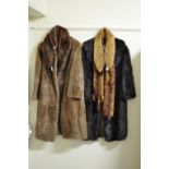 A lady's full length fur coat, bears a label Michaels of Bristol, another similar,