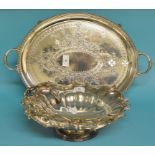 A late Victorian silver plated oval two handled tea tray, with embossed decoration, 50 cm wide,