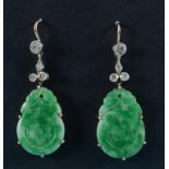 A pair of carved jade and diamond drop earrings  See illustration