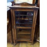 A late Victorian inlaid rosewood music cabinet,