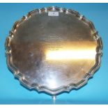 A silver salver, inscribed, on three pad feet, London 1923, approx. 29.