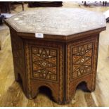 A Moorish style inlaid octagonal table (some loss), 58 cm wide Condition report Report by GH