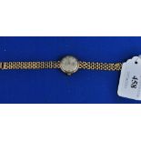 A lady's 9ct gold Rotary wristwatch, with integral 9ct gold bracelet Condition report Report by GH