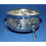 A silver sugar bowl, with embossed decoration, Birmingham 1897, approx. 4.