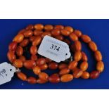 A string of amber style beads, and original clasp (2) Condition report The weight is 71.1 g