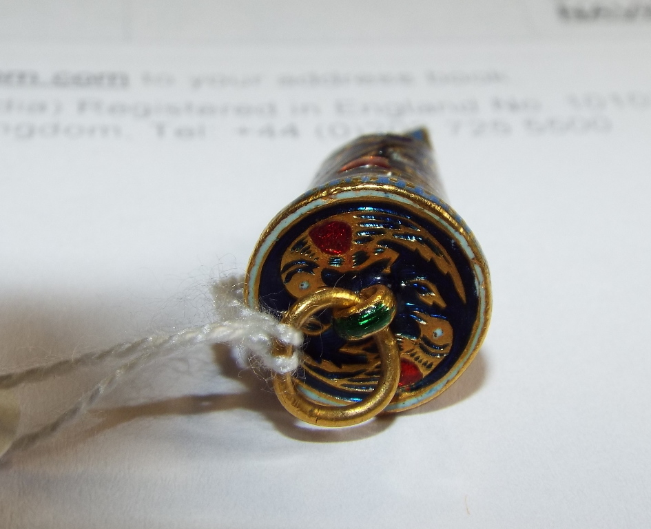 An Indian yellow coloured metal and enamel whistle, decorated birds, flowers and foliage Condition - Image 6 of 7