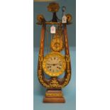 A mantel clock, in the form of a lyre,