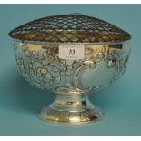 A silver pedestal rose bowl, with rococo style embossed decoration, London 1909, approx. 12.