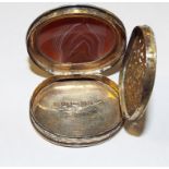 EXTRA LOT: A Victorian oval silver and agate vinaigrette, initialled, with engraved decoration,