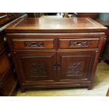 A Chinese sideboard, with two frieze drawers and two panel doors, 88.