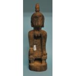 A Leti carved wooden figure, 40 cm high
Provenance: Purchased from Christie's, London 1994 Condition