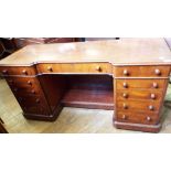 A kneehole desk, adapted from a Victorian mahogany dressing table, 148 cm wide,