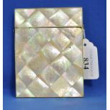 A mother of pearl card case, decorated flowers and foliage,