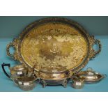 A silver plated warming dish and cover, a similar entree dish, a three piece tea service,