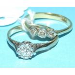 An 18ct gold and three stone diamond ring,