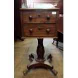 An early Victorian mahogany work table, having two real and two false drawers,