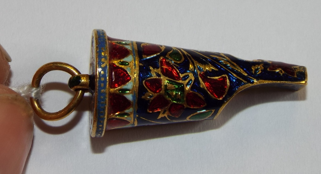 An Indian yellow coloured metal and enamel whistle, decorated birds, flowers and foliage Condition - Image 2 of 7