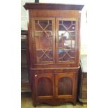 A 19th century floor standing mahogany corner cabinet,