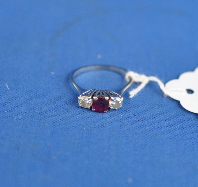An 18ct white gold, ruby and diamond rin