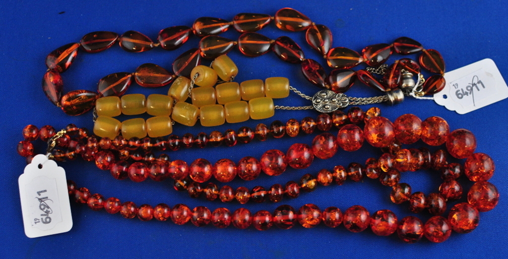 Four amber style necklaces