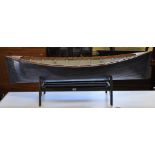 A model of a clinker built rowing boat,