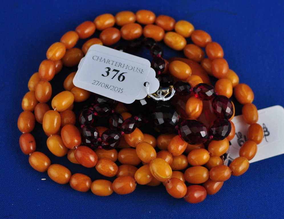 A string of amber style beads, with a te