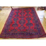 A Turkey carpet, decorated geometric mot