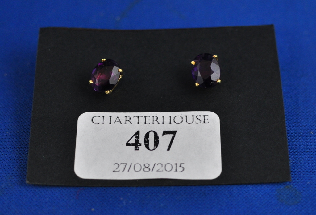 A pair of 18ct gold and amethyst stud ea
