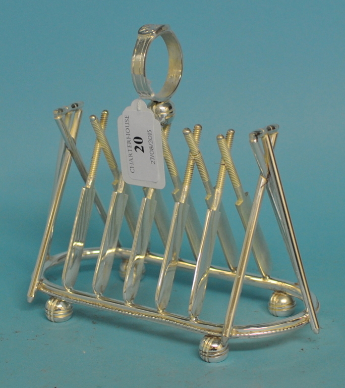 A plated toast rack, in the form of cric