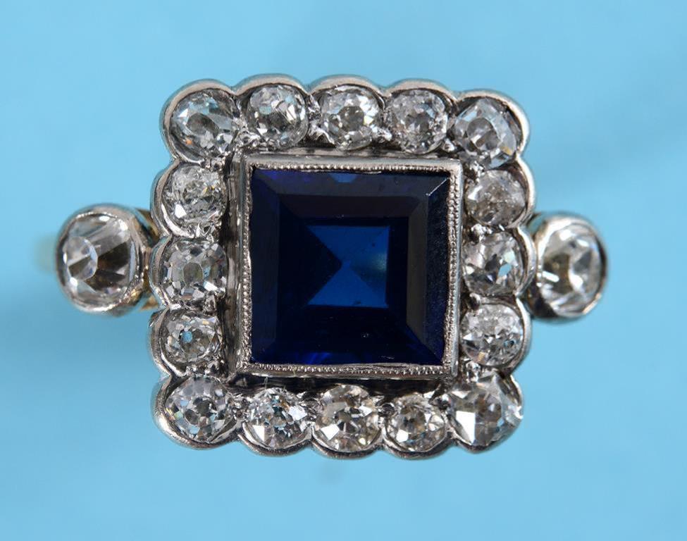 A sapphire and diamond cluster ring, the