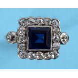 A sapphire and diamond cluster ring, the