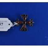 A Maltese cross brooch, set garnets