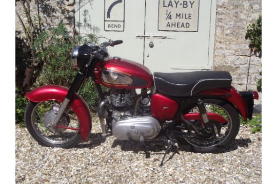 A 1960 Royal Enfield Meteor Minor, registration number 134 RPK, red.