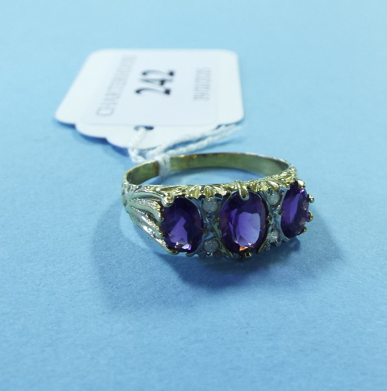 A 9ct gold, amethyst and diamond ring