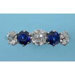 An 18ct white gold, diamond and sapphire