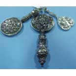 A silver miniature hand mirror, and two